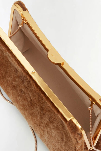 Solange Shearling Clutch in Caramel