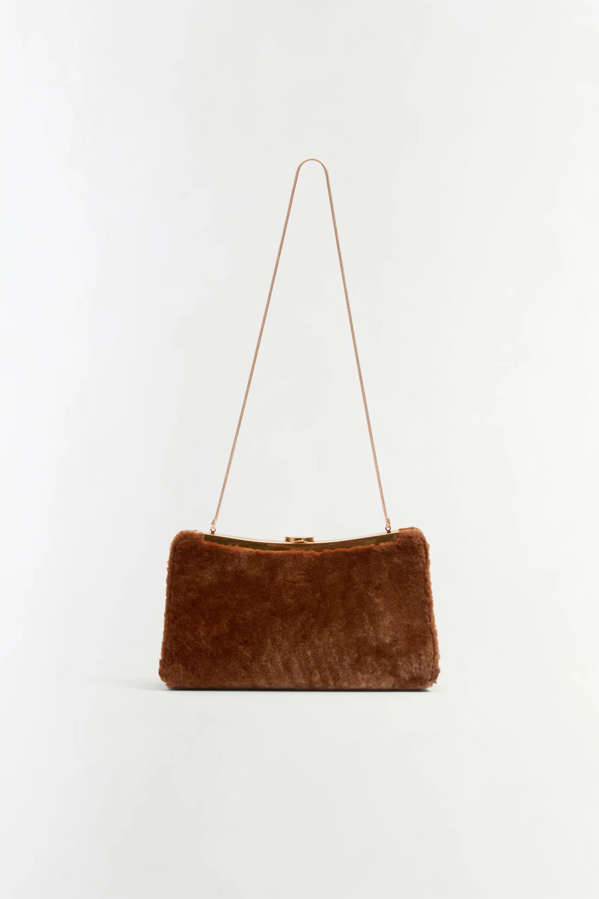 Solange Shearling Clutch in Caramel