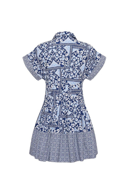 Bunny and Babe Winnetka Nash Mini Dress in Hart Tile Navy. Short-sleeve shirtdress with a fit-and-flare silhouette, featuring a blue and white tile print.
